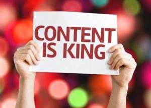 imagine of sign which reads "content is king"
